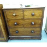 A late 19th/early 20thC mahogany dressing chest, the two short/two long drawers with bun handles,