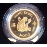 An Elizabeth II Hong Kong gold proof 1000 dollars Lunar Year Coin (The Year of the Monkey) 1980