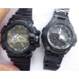 Two similar G-Shock wristwatches,
