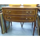 An Edwardian crossbanded satinwood and mahogany bow front chest,