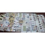 Postage stamps, an uncollated collection of First Day covers,