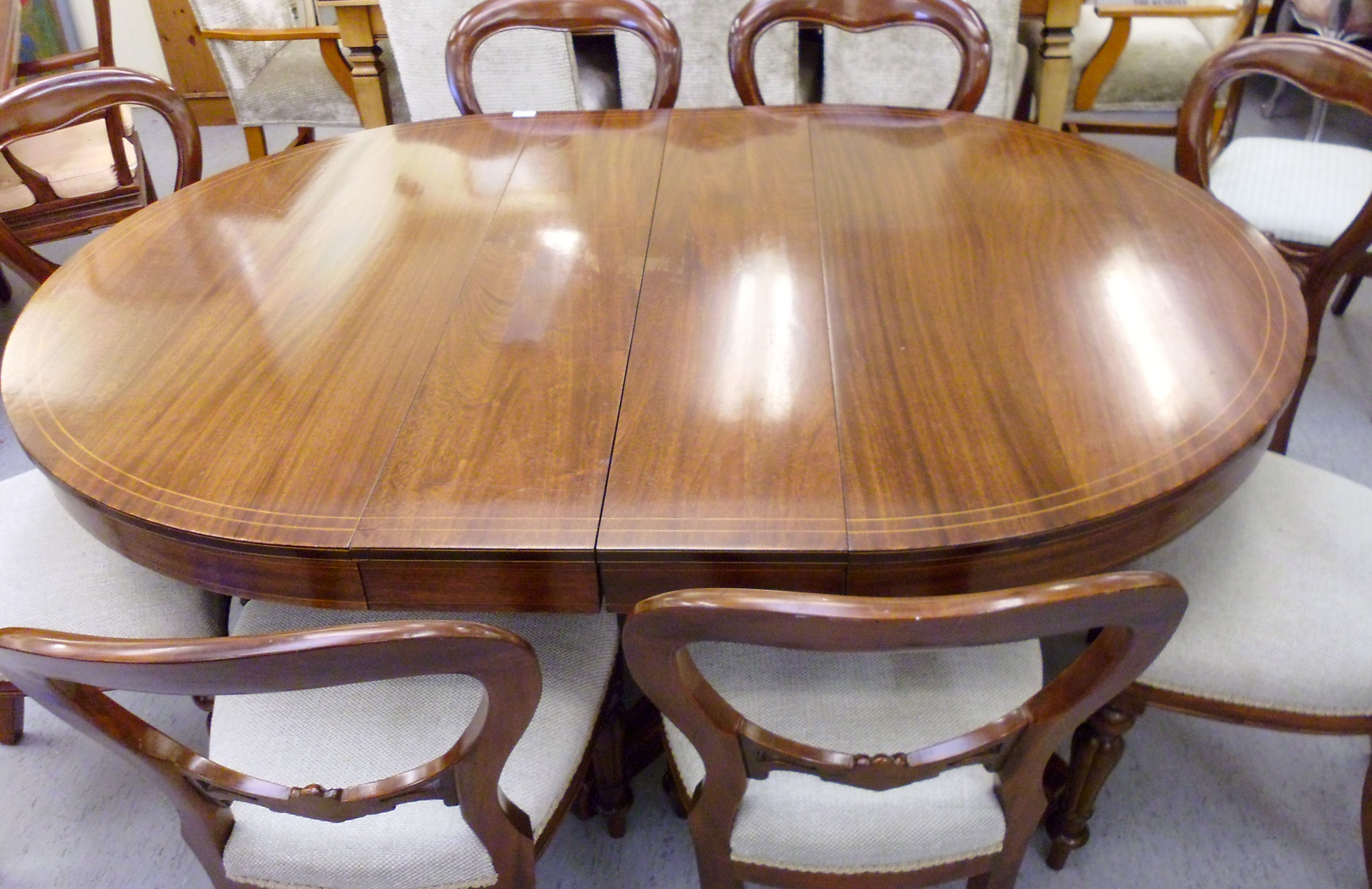An Edwardian satinwood inlaid mahogany dining table, the top with D-shaped ends, - Image 2 of 9