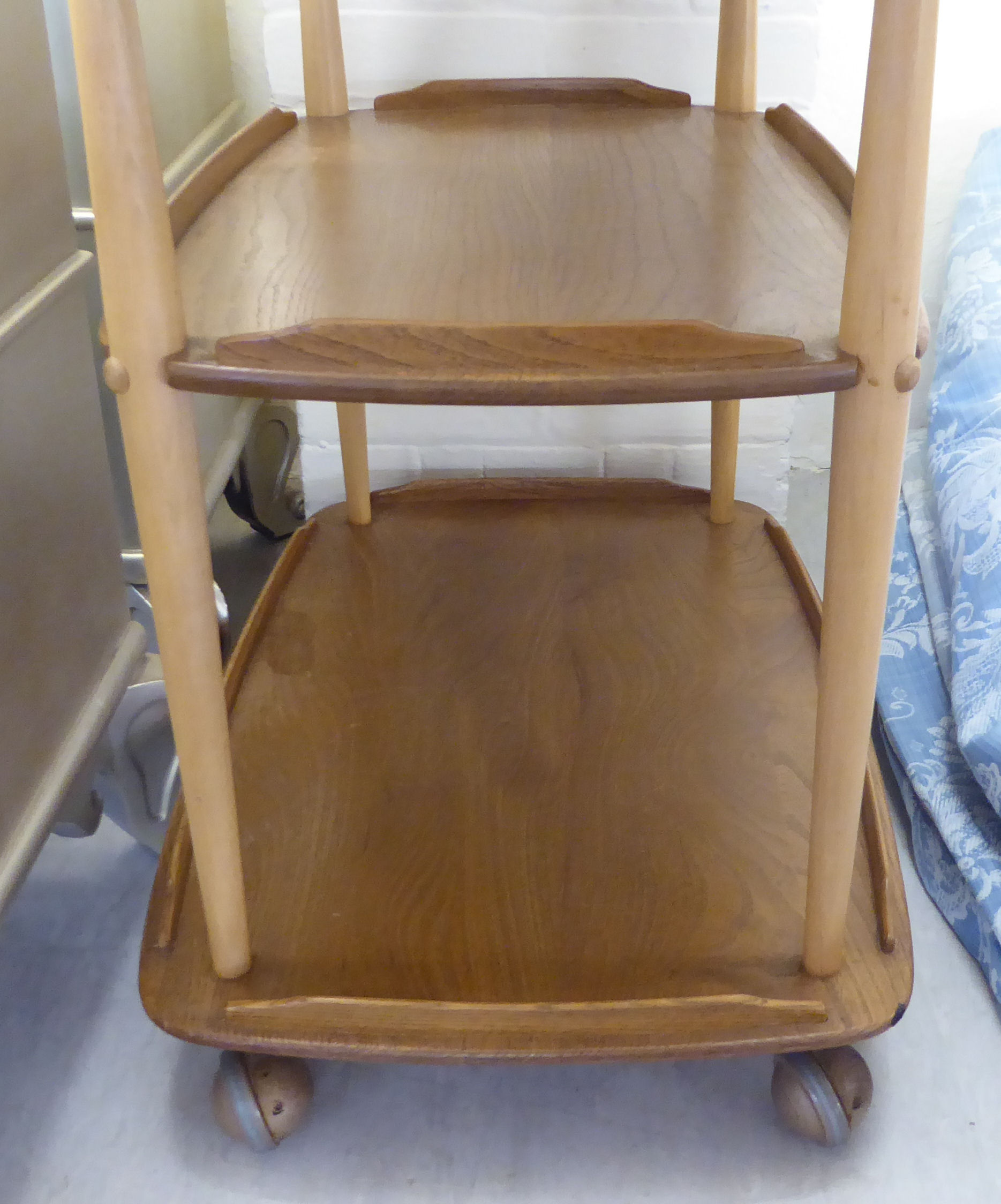 An Ercol beech and elm galleried, three tier tea trolley, - Image 3 of 4