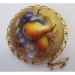 A 9ct gold wire framed brooch, set with a Royal Worcester china, handpainted circular pendant,