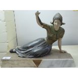 A 1930s Art Deco patinated spelter figure, a Dutch girl,