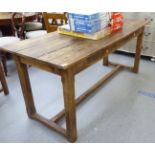 A 20thC rustically constructed pine farmhouse style kitchen table,