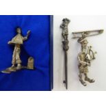 Two silver miniature figures: to include a bagpiper 2.