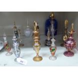 Fourteen blown and moulded glass scent bottles of varying designs 5-8''h OS4