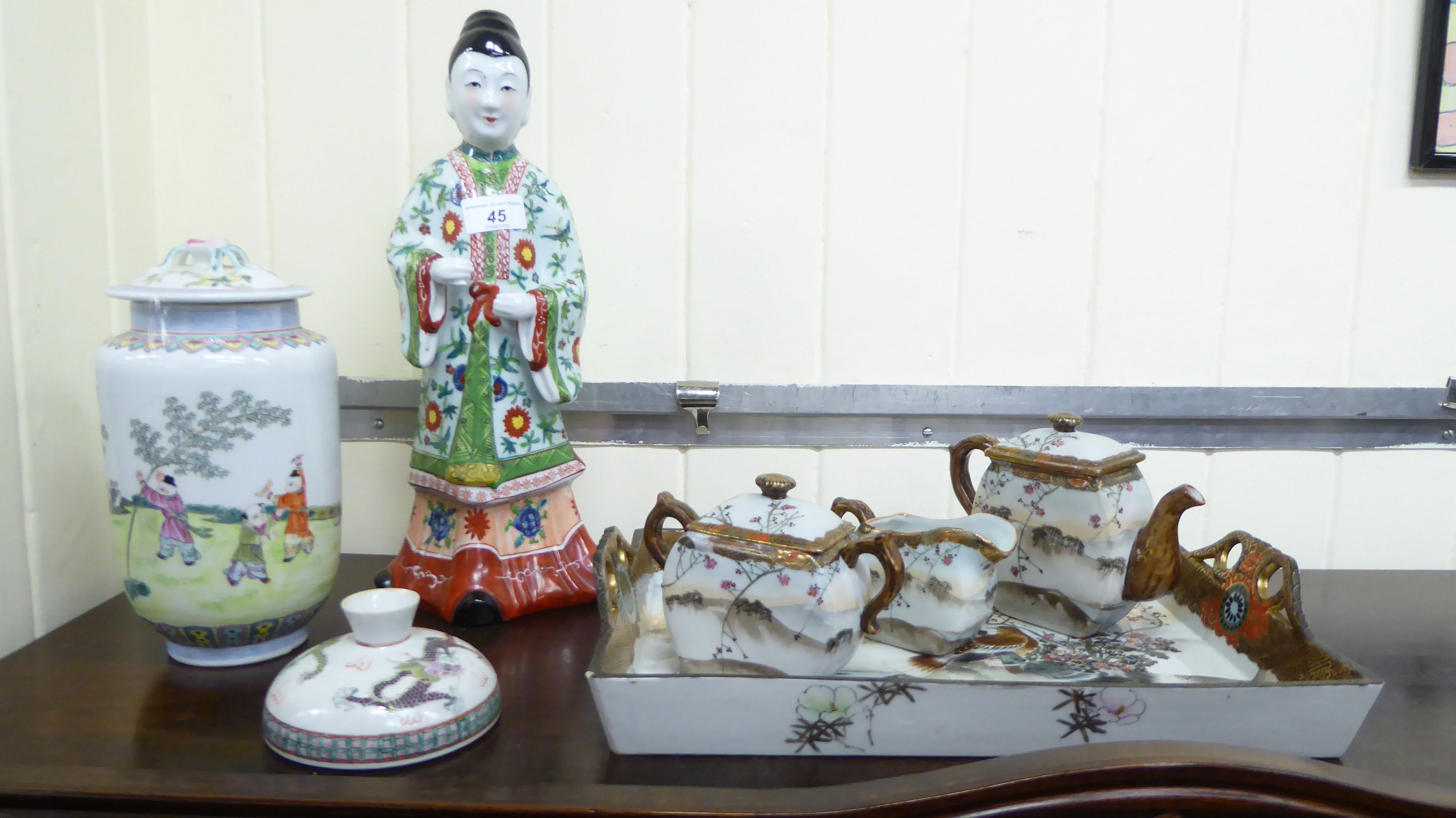 Oriental ceramics: to include a 20thC porcelain figure,