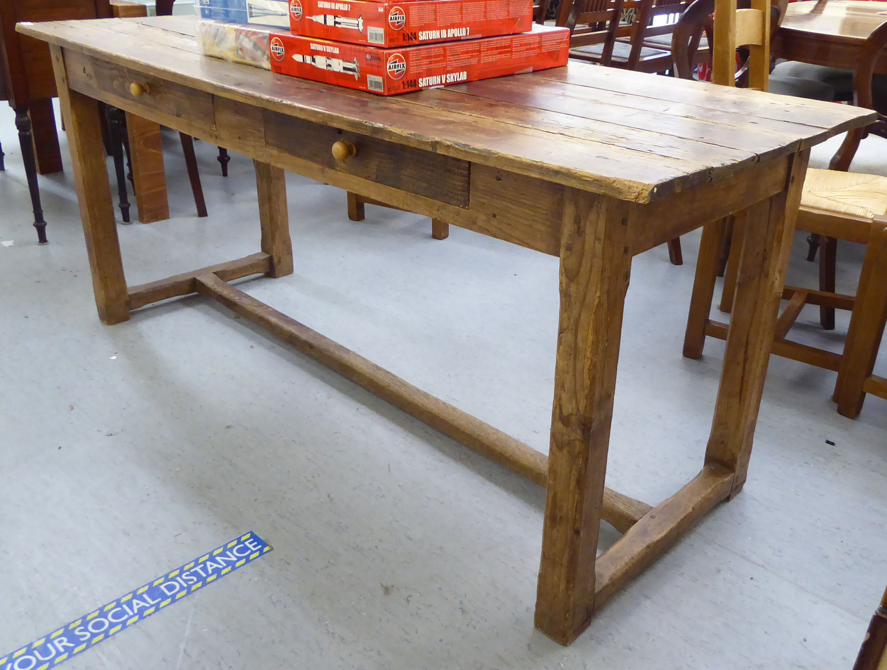 A 20thC rustically constructed pine farmhouse style kitchen table, - Image 2 of 3