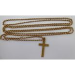 A 9ct gold crucifix;