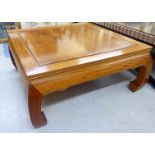 A modern Chinese teak coffee table,