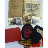 German World War II items: to include embroidered spread eagle and swastika uniform emblems;