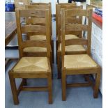 A set of six modern oak ladder back dining chairs,