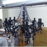 A pair of (as new) Fair Trade International twelve branch chandeliers 26''drop 30''spread BSR