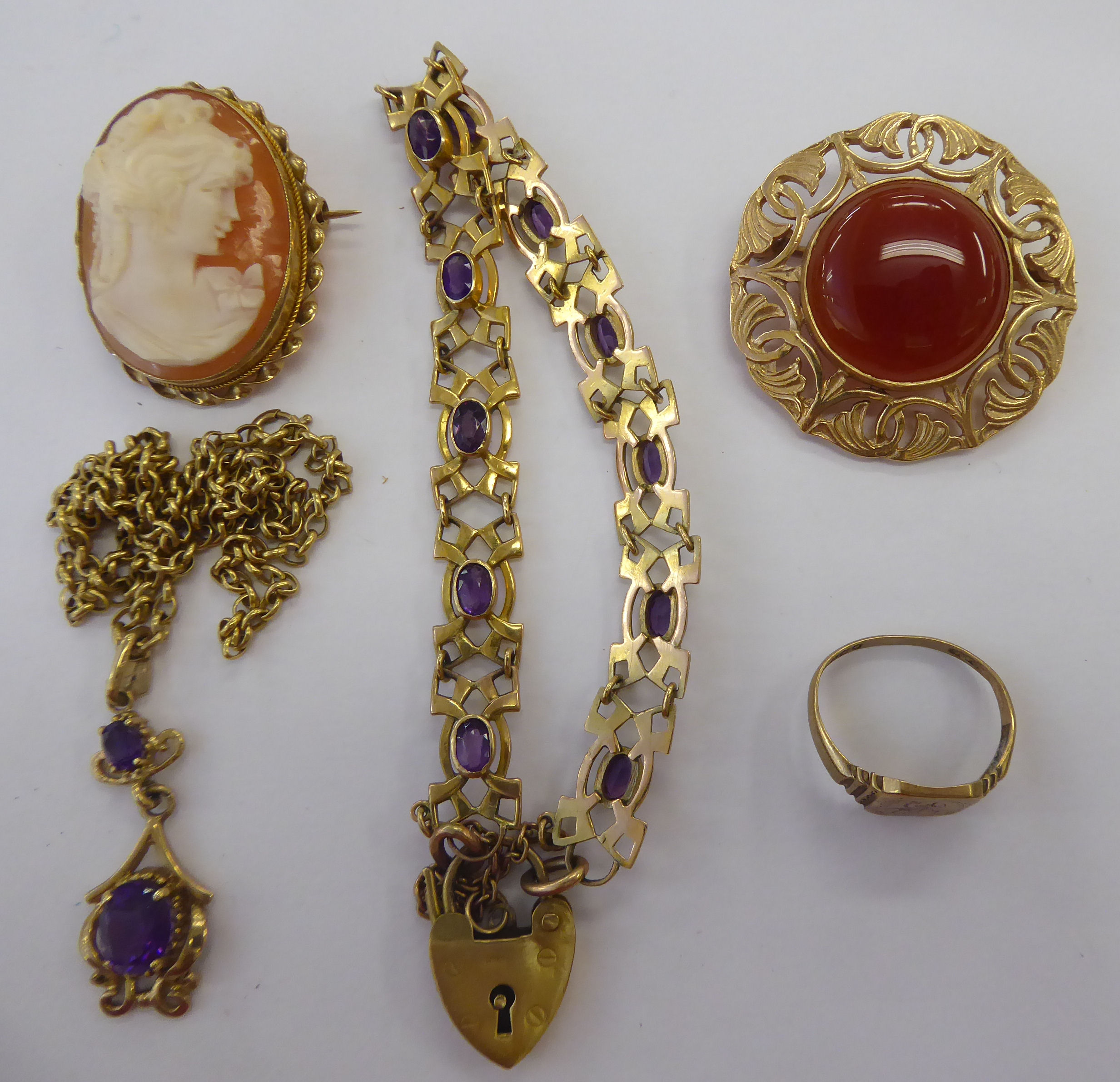 Yellow metal items of personal ornament: to include a brooch,
