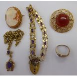 Yellow metal items of personal ornament: to include a brooch,