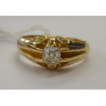 An 18ct gold gypsy set single stone diamond ring 11