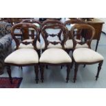 A set of six reproduction early Victorian style mahogany framed balloon back dining chairs,