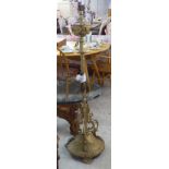 A late Victorian gilt metal oil lamp (converted to electricity) 54''h CA