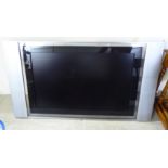 A Sony Wega 30'' flatscreen television with remote control CB