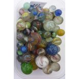 Variously decorated 19thC and 20thC glass and other marbles mixed styles OS10