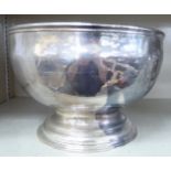 A 19thC silver plated punch bowl with an applied wire rim,