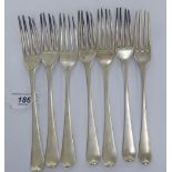 A matched set of seven 19thC silver Old English pattern table forks mixed marks 11