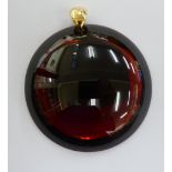 A Baccarat dome shaped, toned red and blue pendant,