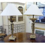 A pair of modern 'antique' stone effect, pedestal table lamps,