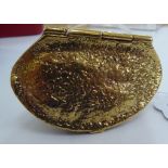A gold plated purse,
