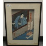 An early 20thC Japanese, tinted woodcut, featuring a figure wearing traditional costume,