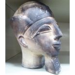 A Egyptian carved stone head,