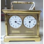 A modern French lacquered brass cased miniature timepiece,