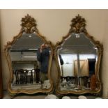 A pair of modern French 'antique' inspired mirrors, the shaped plates,