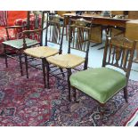 A pair of Edwardian mahogany framed and marquetry bedroom chairs with railed backs and woven rush