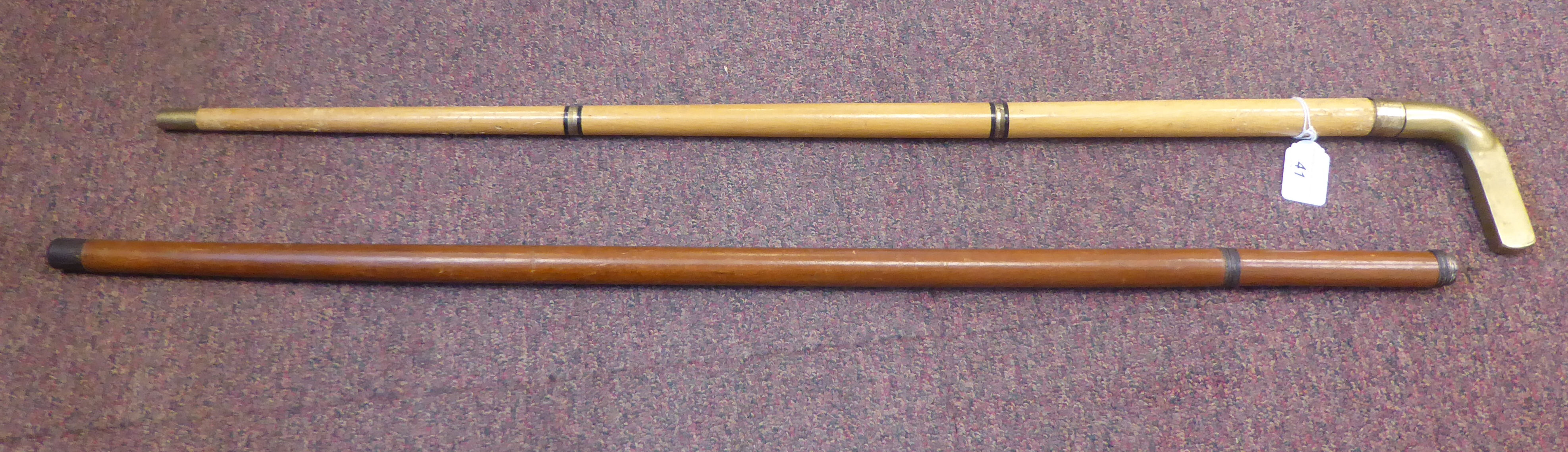 A lacquered walking cane,