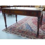 A late 19thC style mahogany writing table, the top with an inset, tooled and gilded hide scriber,