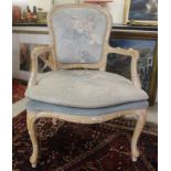 A modern Chinese inspired cream wash painted, bamboo effect, open arm chair,
