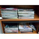 A collection of vinyl 45rpm singles and albums, rock and pop: to include 'Abba', 'Rod Stewart',