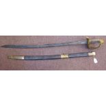 A British Naval officer's dress sword with a gilt metal lion's head pommel,