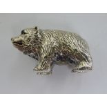 A silver coloured metal miniature model,