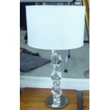 A modern faux crystal effect table lamp,