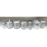 Nine late 19th/20thC variously cut glass dressing table/vanity box receptacles with a variety of