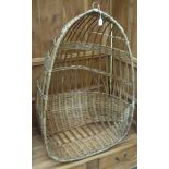 A woven cane shell design egg chair with a pendant ring 44''h LSB