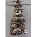 A Sterling silver miniature model, a seated cat wearing a crown,