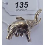 A silver coloured metal miniature model trumpeting elephant 11