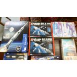 Model kits relating to space travel: to include an AMT Saturn V rocket and Apollo spacecraft boxed