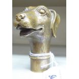 A cast bronze walking cane terminal,