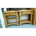 A pair of modern honey coloured pine bedside tables, each with a short drawer, over an undershelf,